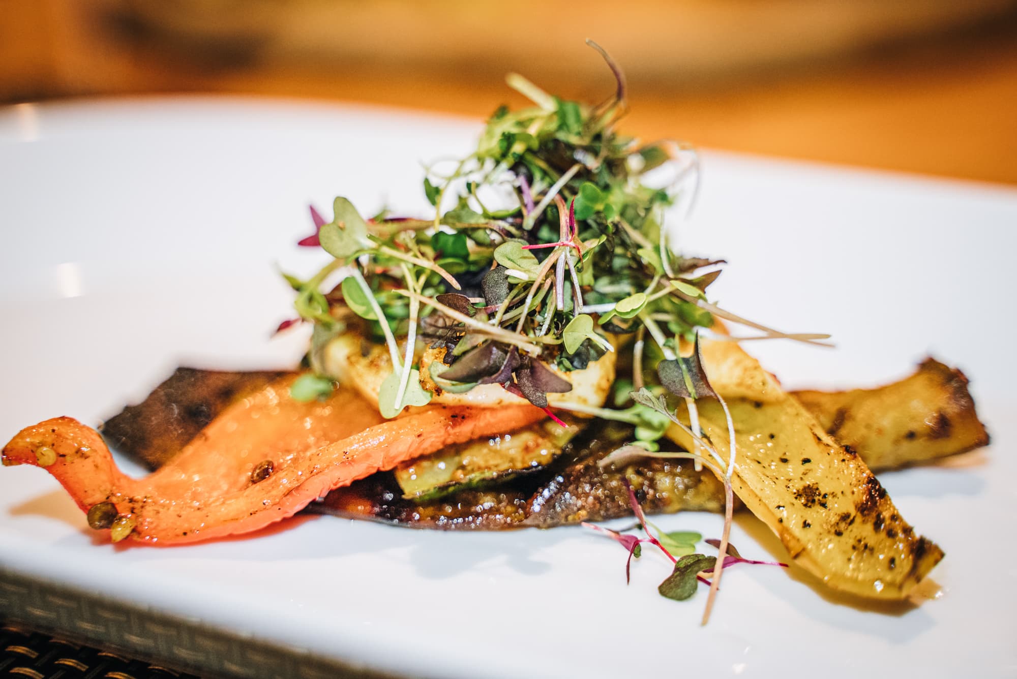 An entree with greens as garnish