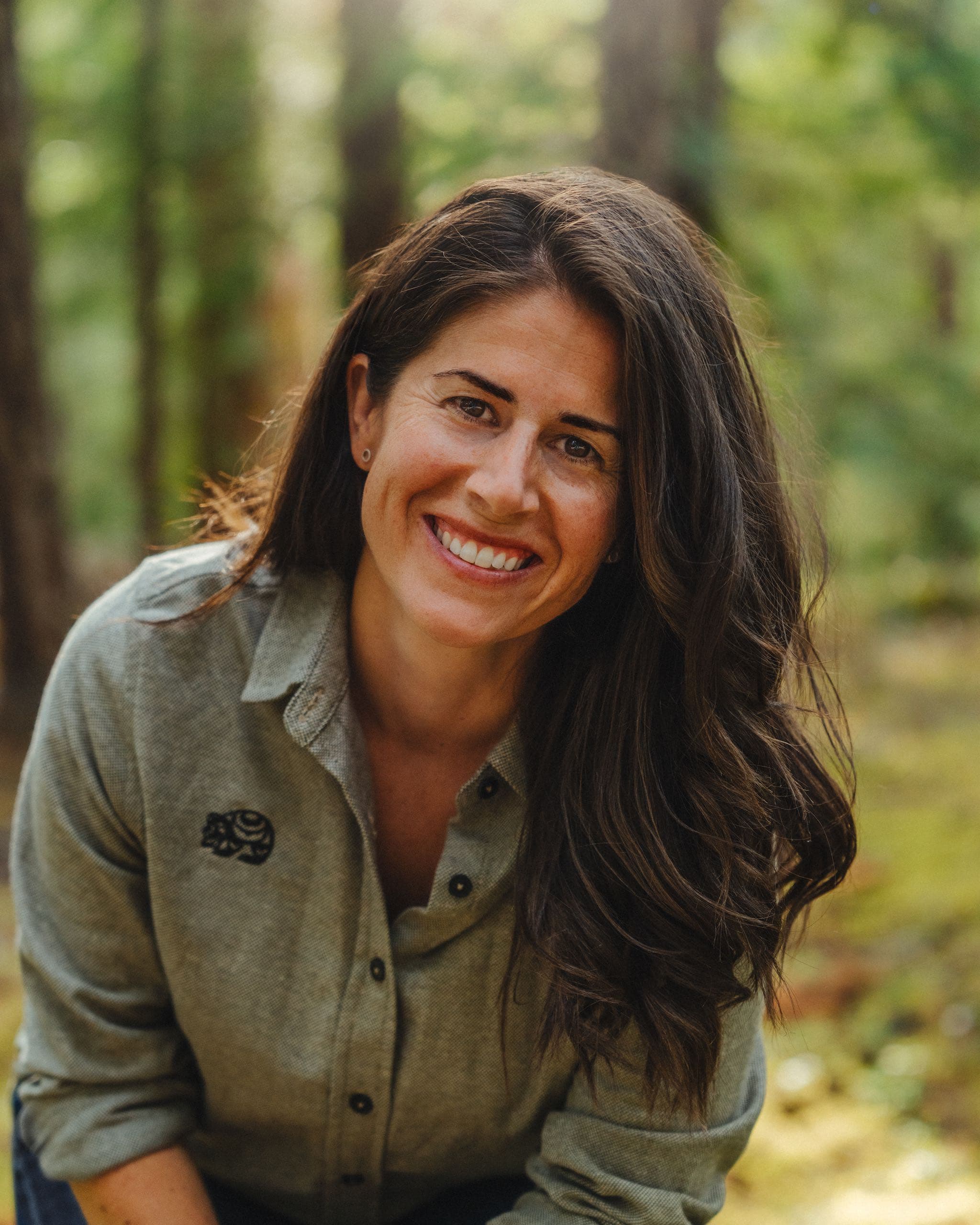 Kourtney McKercher walking in the woods