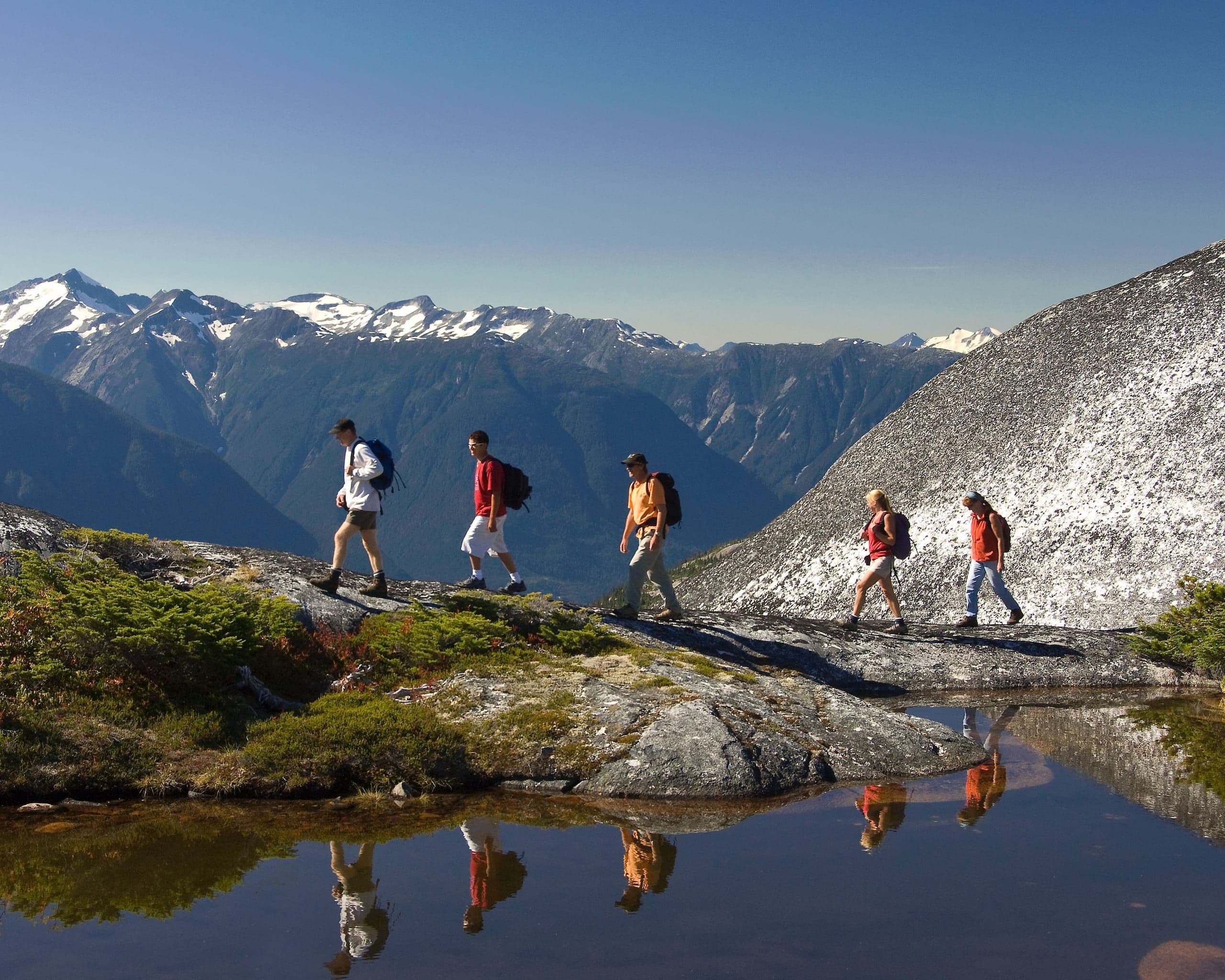 A group of people hiking on a mountain