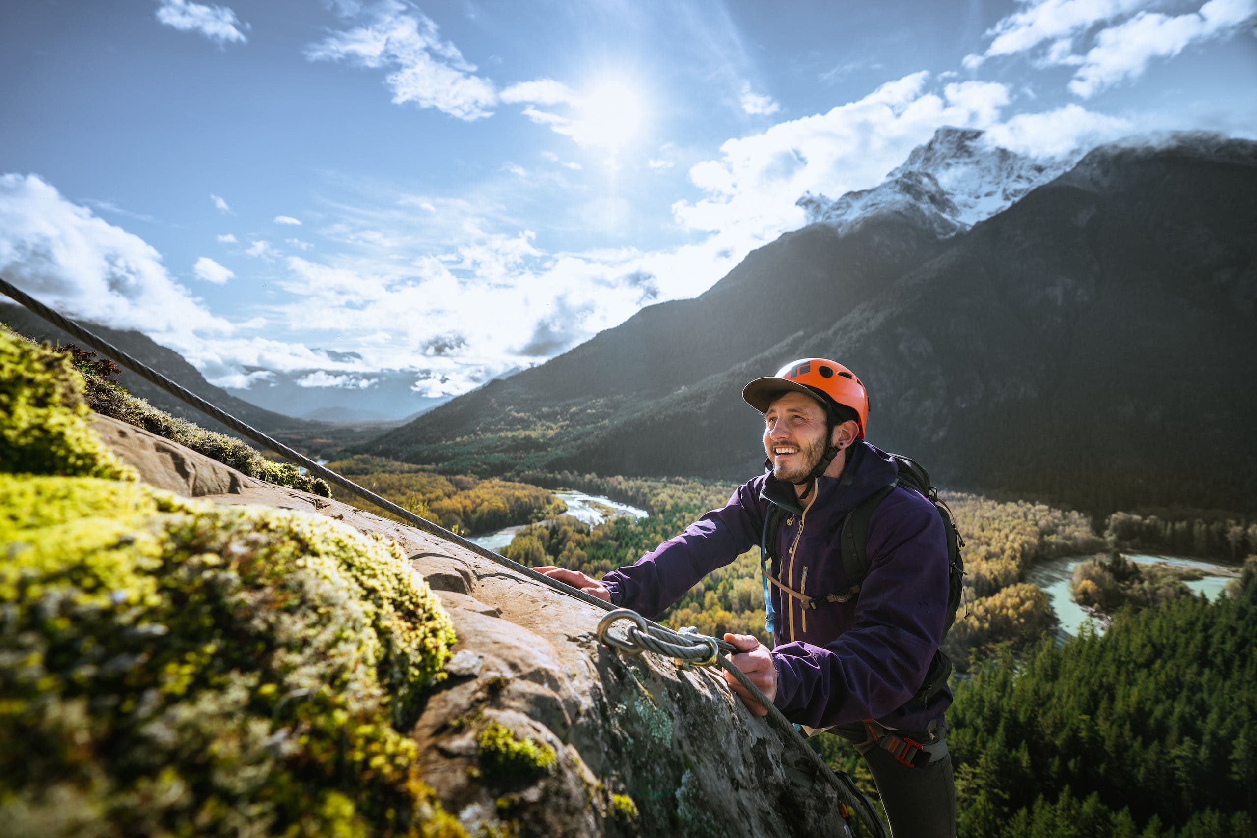A man climbing a mountain