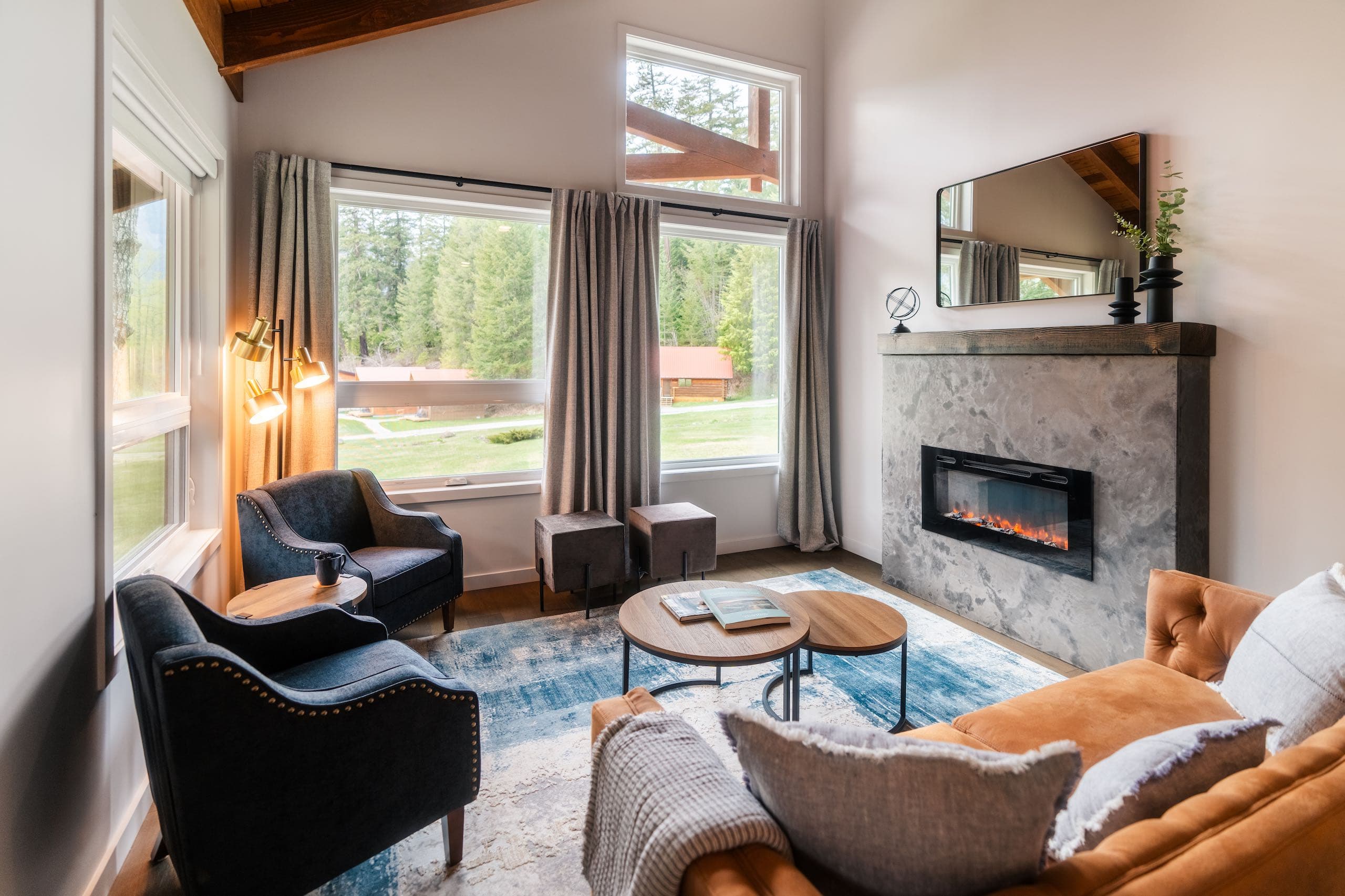 Seating area with large windows and fireplace