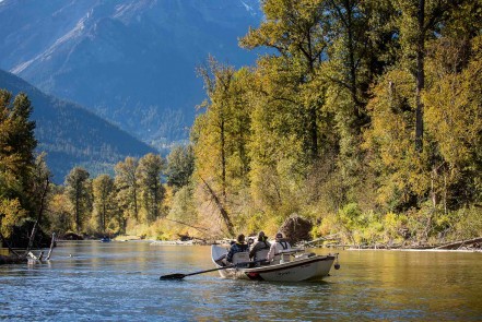 Drift boat in foreground, raft in background